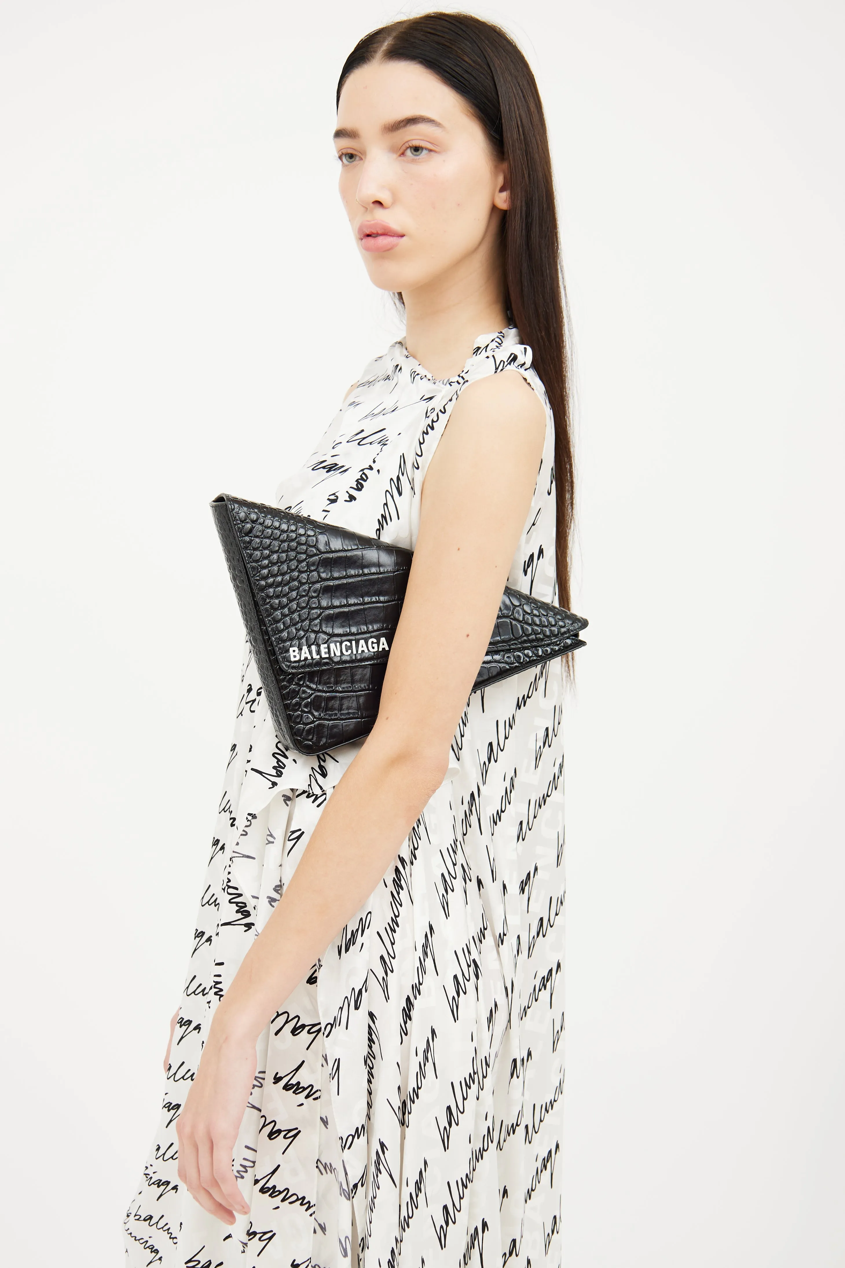 Black Embossed Triangle Clutch