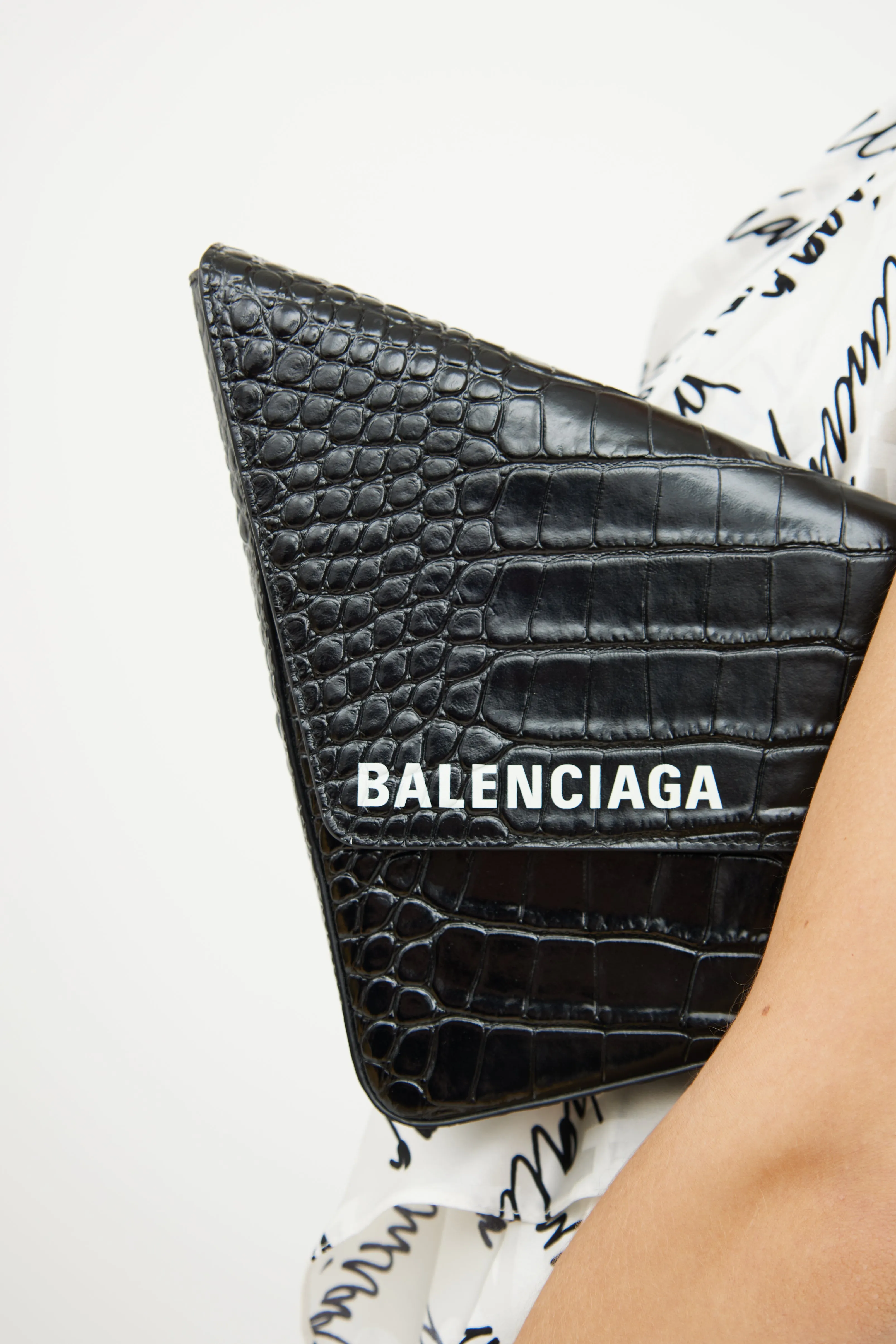 Black Embossed Triangle Clutch