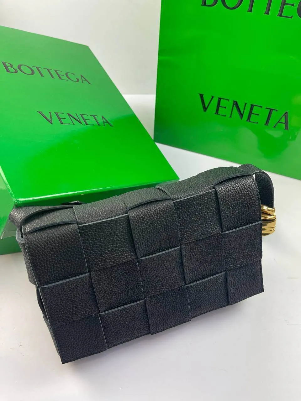 BOTTEGA VENETA Cassette Intrecciato grained leather shoulder bag black